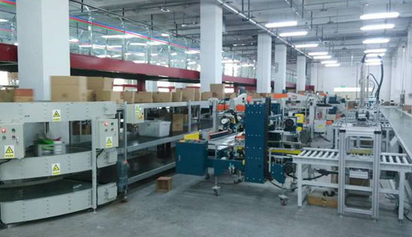 Automatic packing and labeling system of packing machine